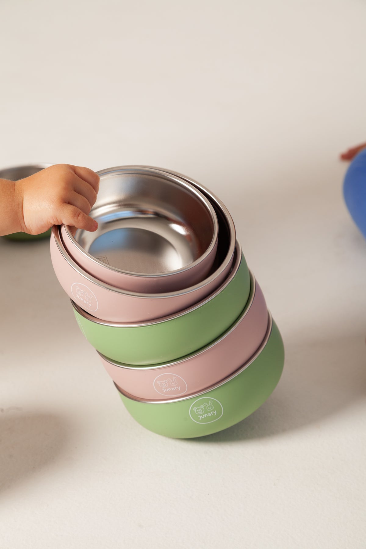 Green and pink silicone and stainless-steel bowl.