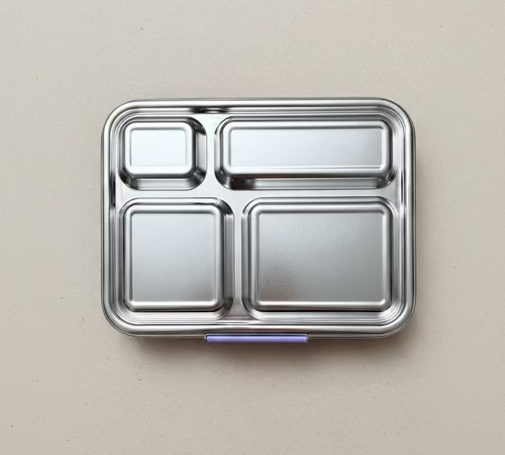 A stainless-steel compartment lunch box with four sections, top view.