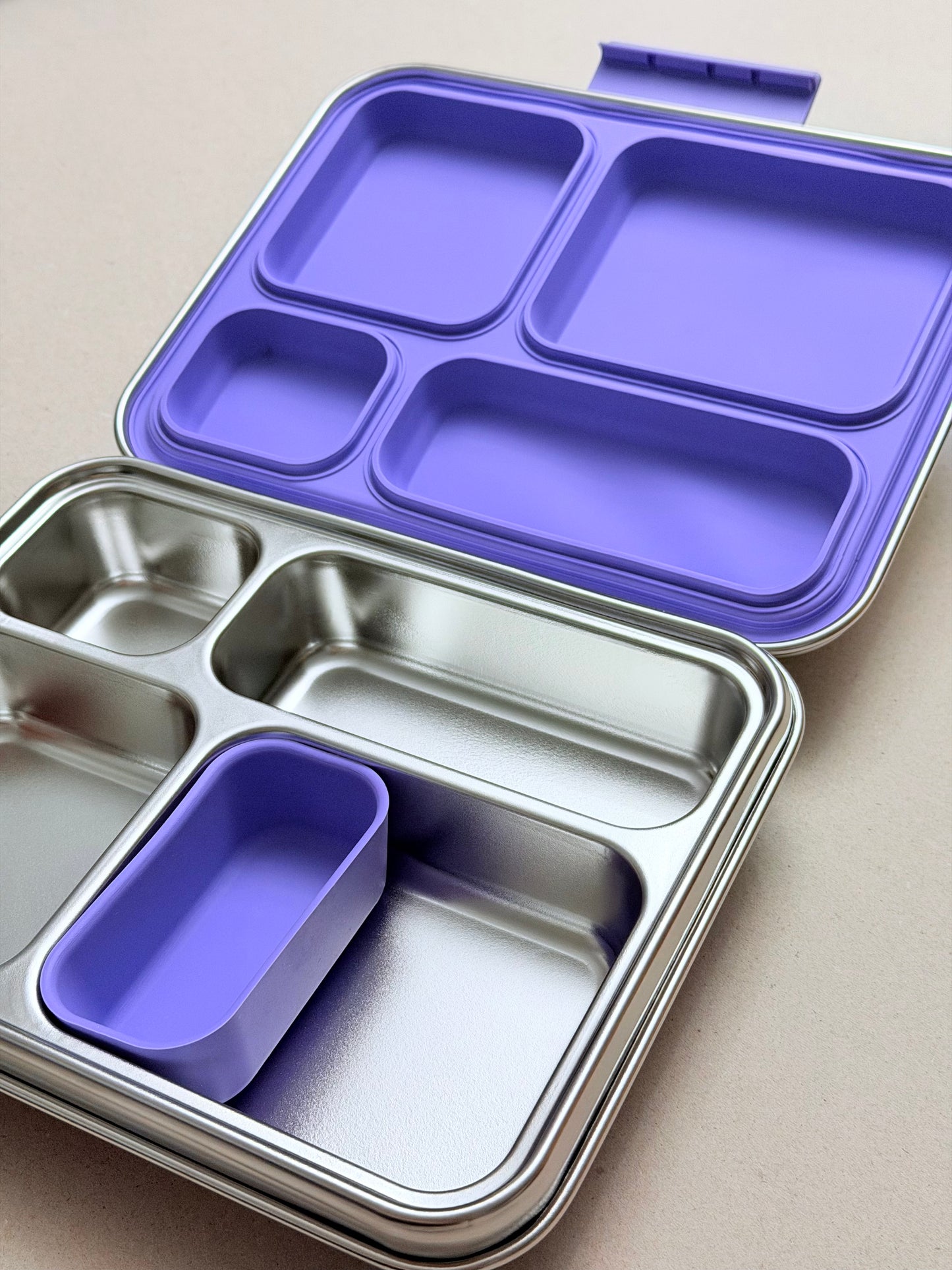Violet Stainless-steel Bento Lunchbox with silicone seal lid insert and snack cup.