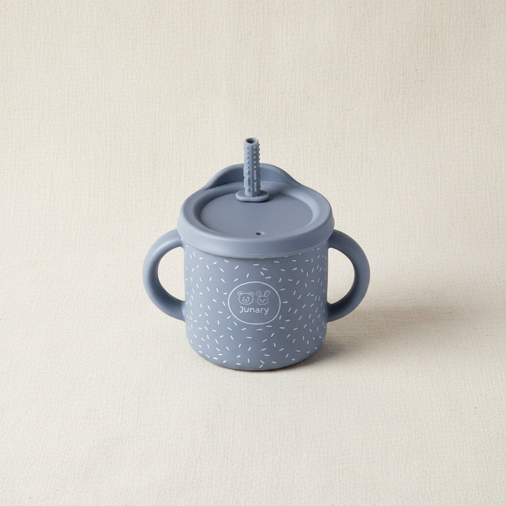 Blue Sips cup with two handles. Removable lid and straw. Stainless-steel and silicone speckles pattern. 