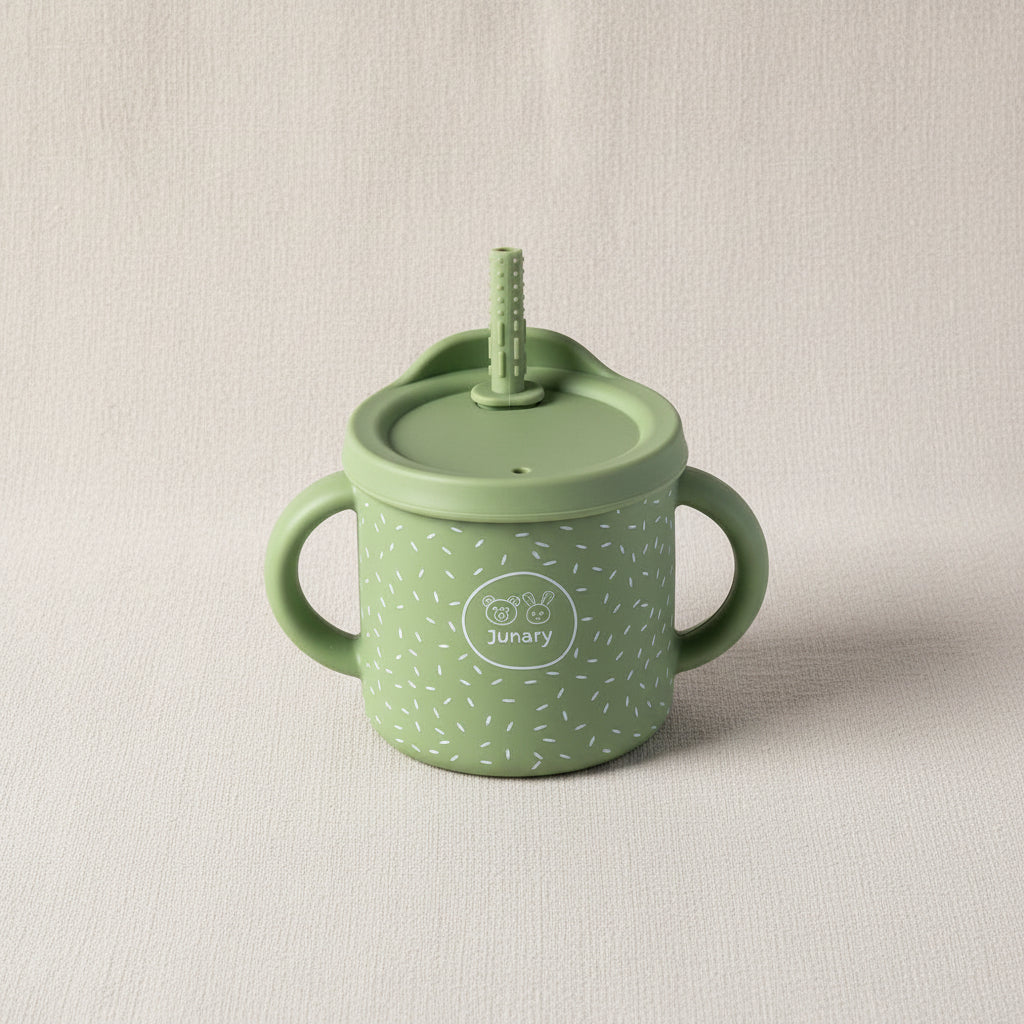 Green sips cup with two handles and removable lid wit straw. Stainless-steel and silicone speckled pattern.