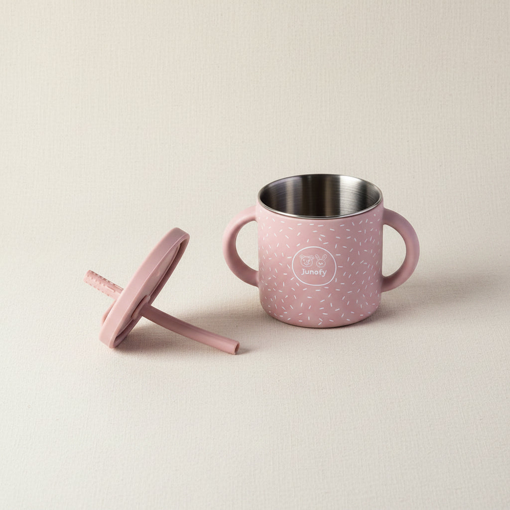 Pink sips cup with removable lid and straw. Stainless-steel inside and silicone speckle pattern.