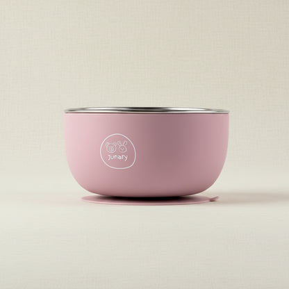 A pink Junary baby stainless-steel bowl with a silicone suction base.