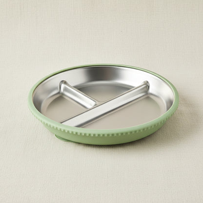 A stainless-steel divided plate with a green silicone and suction base.