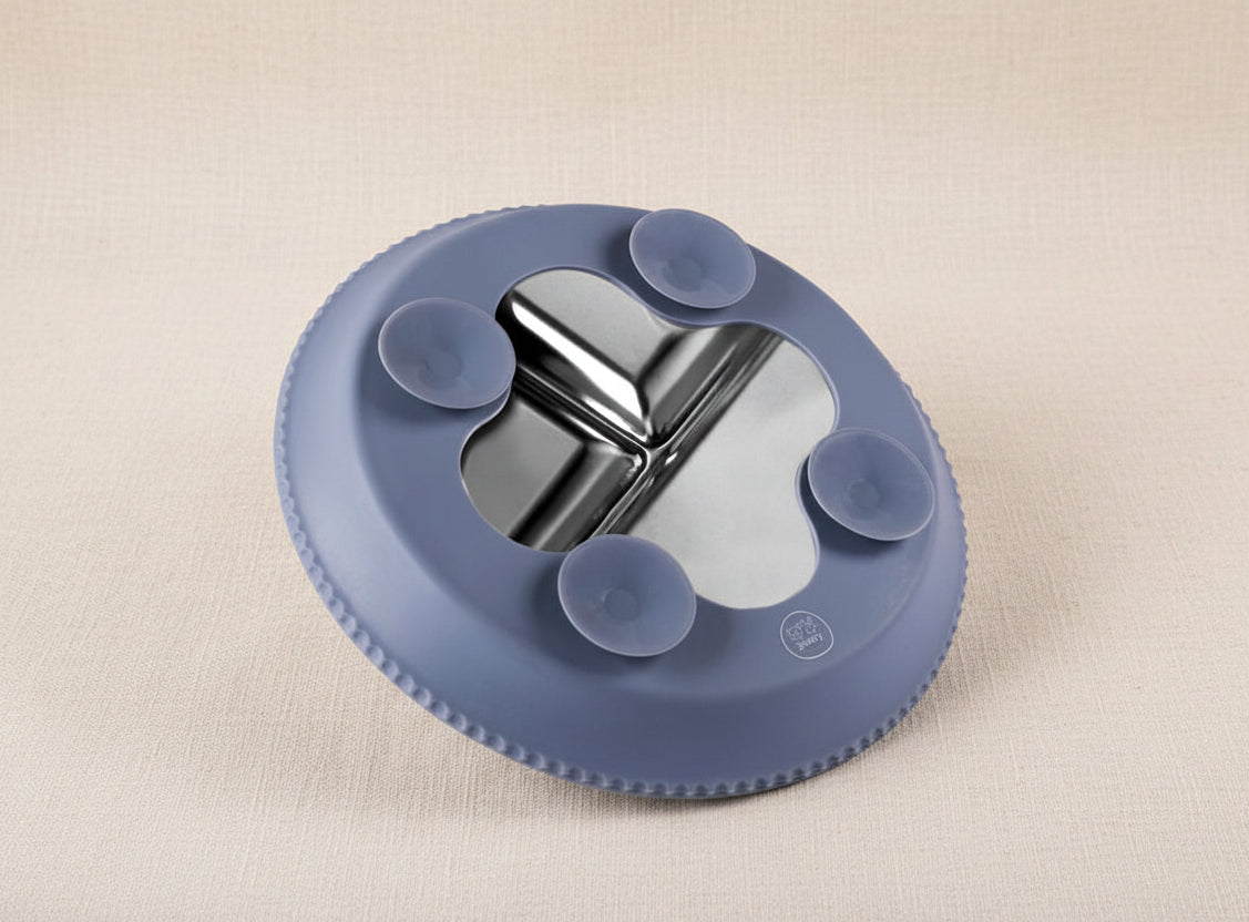 Blue silicone and stainless-steel suction plate.