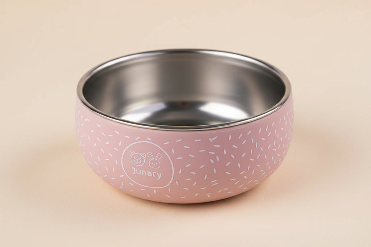 Little pink silicone and stainless-steel bowl with speckled pattern.