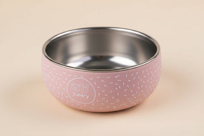 Little pink silicone and stainless-steel bowl with speckled pattern.