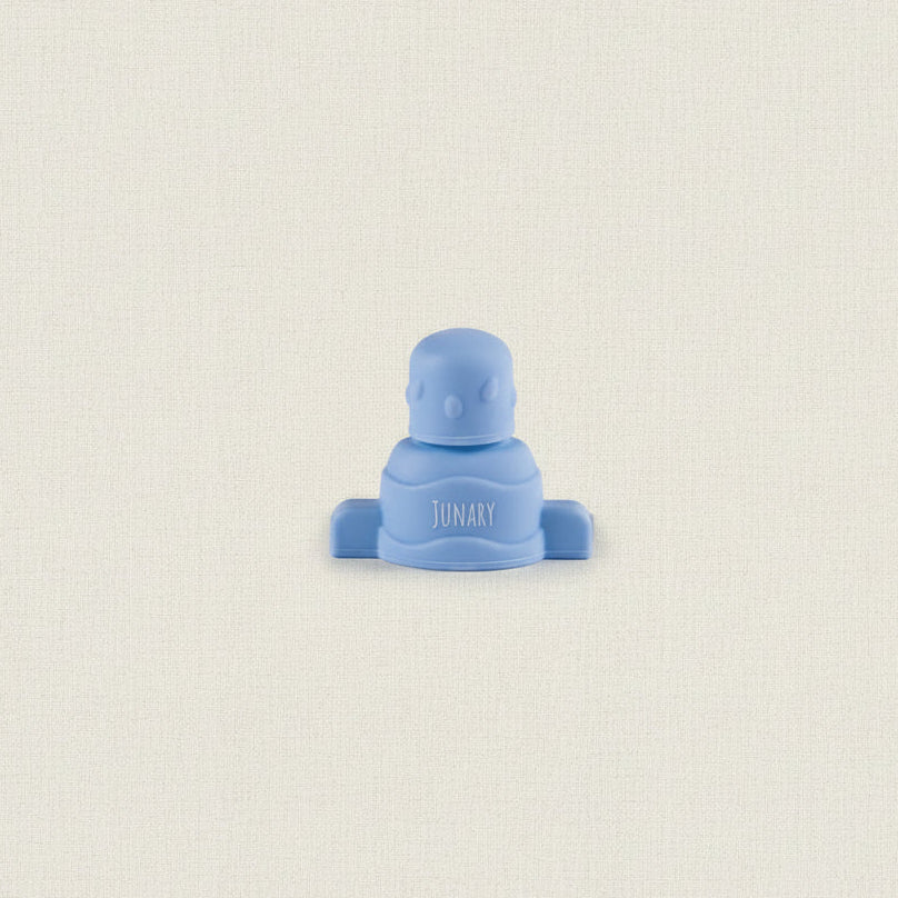 Blue silicone pouch topper for baby squishy pouches. 