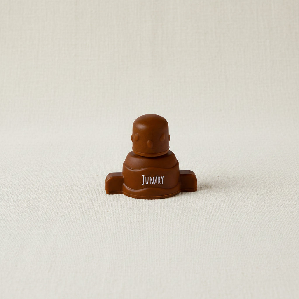 Brown silicone pouch topper for baby squishy pouches. 