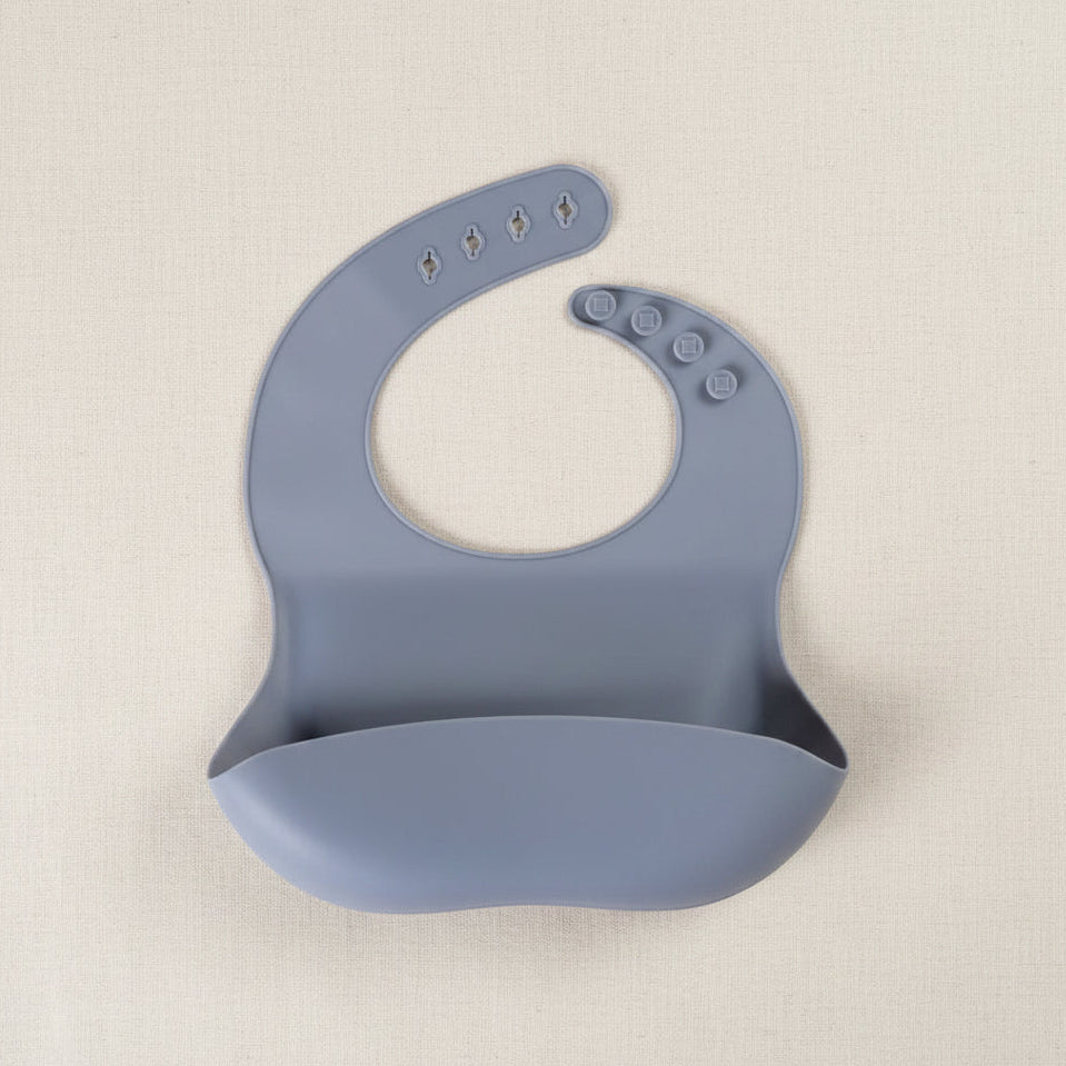 Blue silicone bucket bib for babies.