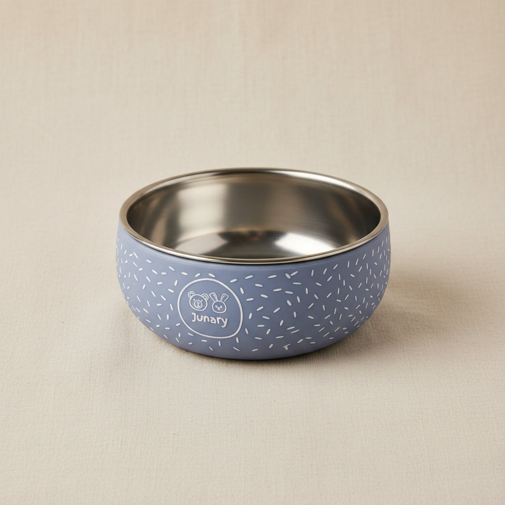 Little blue silicone and stainless-steel bowl with speckled pattern.