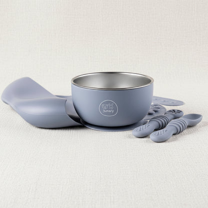 Blue 3-piece Silicone baby feeding set. Including a stainless-steel bowl with suction, a Silicone bib and slow feeders 